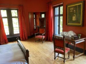 Postel nebo postele na pokoji v ubytování Chateau Tout Y Fault