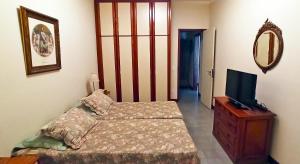 En eller flere senge i et værelse på Apto Ocean Drive - Praia da Barra + 30 billeder