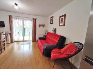 Posezení v ubytování Au doux refuge, charmant T2 bis, parking gratuit, proche thermes, 6 personnes