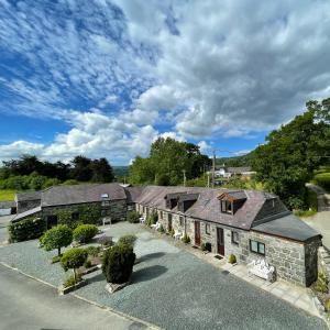 an overhead view of a house with a driveway at Snowdonia Holiday Cottages in Conwy
