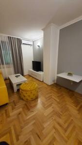 TV a/nebo společenská místnost v ubytování Apartment Denza City Center Sarajevo