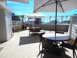 Uma varanda ou terraço em Normandy Hotel