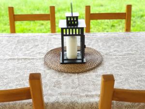 a candle sitting on top of a table at A CASA DO SABUGUEIRO in Rábeda