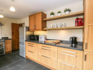 A cozinha ou cozinha compacta de Mulberry Cottage