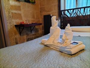 Postel nebo postele na pokoji v ubytování B&B Malennio