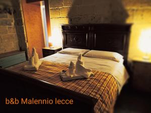 Postel nebo postele na pokoji v ubytování B&B Malennio