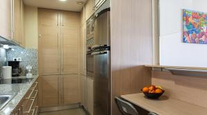 Kuchyň nebo kuchyňský kout v ubytování Apartment familiar