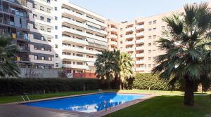 Bazén v ubytování Apartment familiar nebo v jeho okolí
