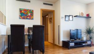 TV a/nebo společenská místnost v ubytování Apartment familiar