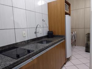 Kitchen o kitchenette sa Pousada Oliveira