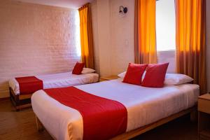 Säng eller sängar i ett rum på Hotel La Posada de Ugarte