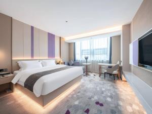Postel nebo postele na pokoji v ubytování Lavande Hotel Qihe Economic Development Zone