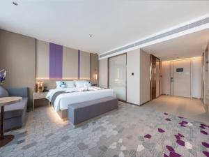 Postel nebo postele na pokoji v ubytování Lavande Hotel Qihe Economic Development Zone