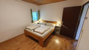 Postel nebo postele na pokoji v ubytování Apartmán Tauplitz