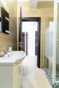 Et badeværelse på Apartament Tudor