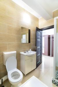 Et badeværelse på Apartament Tudor + 10 billeder