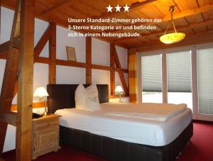 Ein Bett oder Betten in einem Zimmer der Unterkunft Hotel Antoniushütte