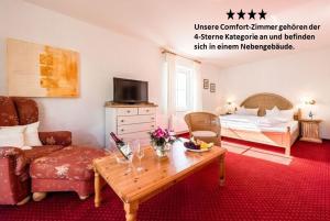 Ein Bett oder Betten in einem Zimmer der Unterkunft Hotel Antoniushütte