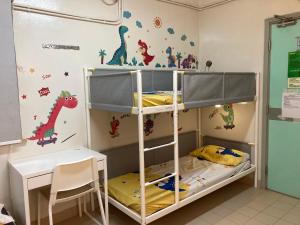 Μία ή περισσότερες κουκέτες σε δωμάτιο στο YHA Ngong Ping SG Davis Youth Hostel