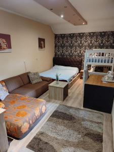 Posezení v ubytování Guest House Maja