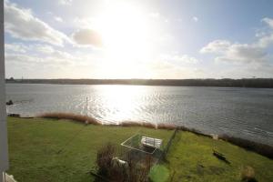 a view of a large body of water at Dünenhof DB3 042 Dünenhof in Heiligenhafen