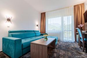 Χώρος καθιστικού στο Hotel Orizont