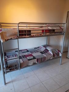 Dviaukštė lova arba lovos apgyvendinimo įstaigoje Casa di olmo