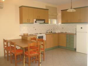Kuchyň nebo kuchyňský kout v ubytování Stelios Apartments