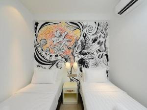 Postel nebo postele na pokoji v ubytování Hotel de Art USJ 21
