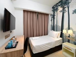 TV a/nebo společenská místnost v ubytování Hotel de Art USJ 21