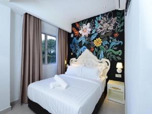 Postel nebo postele na pokoji v ubytování Hotel de Art USJ 21