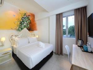 Postel nebo postele na pokoji v ubytování Hotel de Art USJ 21