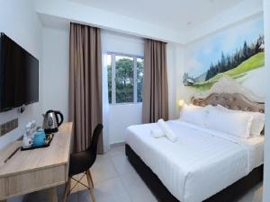 Postel nebo postele na pokoji v ubytování Hotel de Art USJ 21