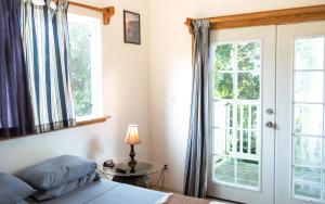 Postel nebo postele na pokoji v ubytování Hilo Vacation Rental