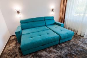 Χώρος καθιστικού στο Hotel Orizont