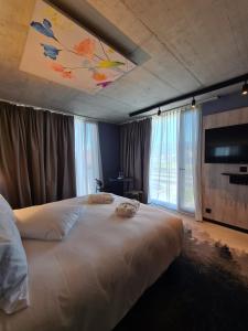 Mercure Hotel Delémont客房内的一张或多张床位