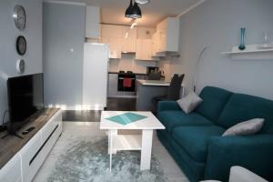 Kuchyňa alebo kuchynka v ubytovaní Uroczy Apartament- Kołobrzeg