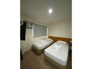Un baño de OYO 878 Dg Budget Hotel Naia