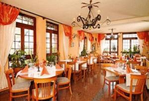 Un restaurant sau alt loc unde se poate mânca la L´Antica Ruota - Zum Alten Wasserrad +4 fotografii