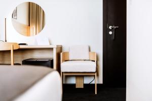 Voodi või voodid majutusasutuse Hotel Septembar toas