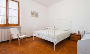 Ein Bett oder Betten in einem Zimmer der Unterkunft AmareNumana