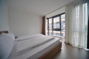 Postel nebo postele na pokoji v ubytování Bayer's Boardinghouse und Hotel
