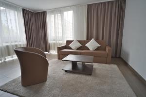 Posezení v ubytování Bayer's Boardinghouse und Hotel