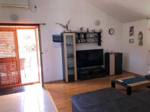 TV a/nebo společenská místnost v ubytování Apartman Sternak