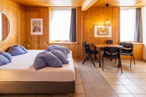 Postel nebo postele na pokoji v ubytování Seehotel Sternen