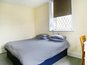 מיטה או מיטות בחדר ב-OYO Castle Hotel, Accrington