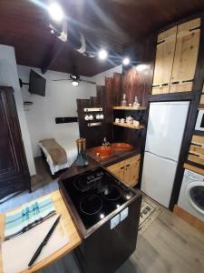 A kitchen or kitchenette at El Rinconcito