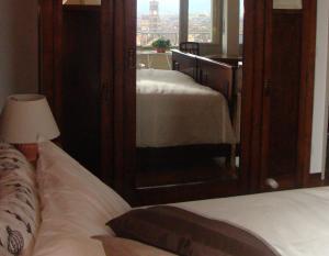 Posteľ alebo postele v izbe v ubytovaní Gianduja B&B