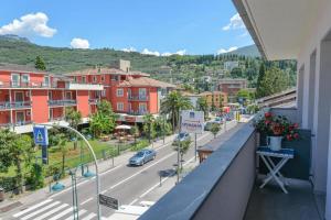 a view of a city from a balcony of a building at Casa al Lago in Riva del Garda