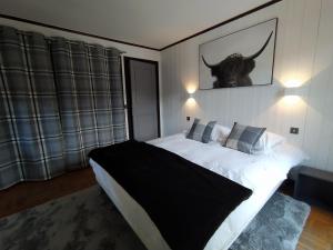 Chalet Appart'Hôtel l'Eau Vive客房内的一张或多张床位
